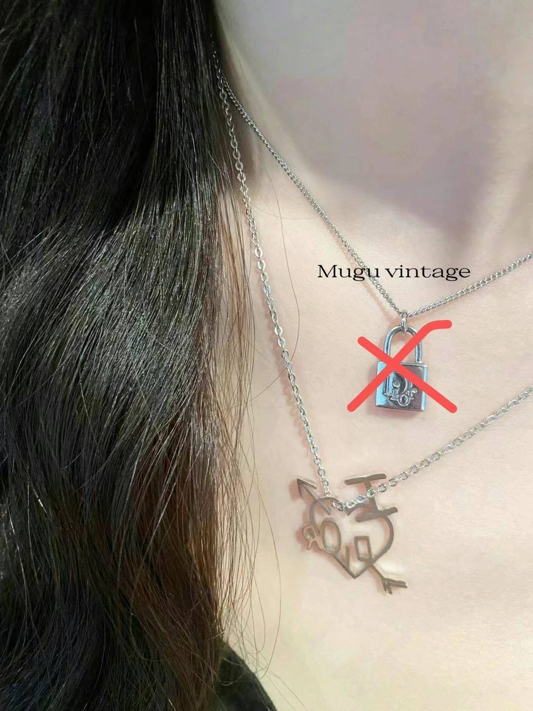 Dior 2000s I love Dior Cupid necklace