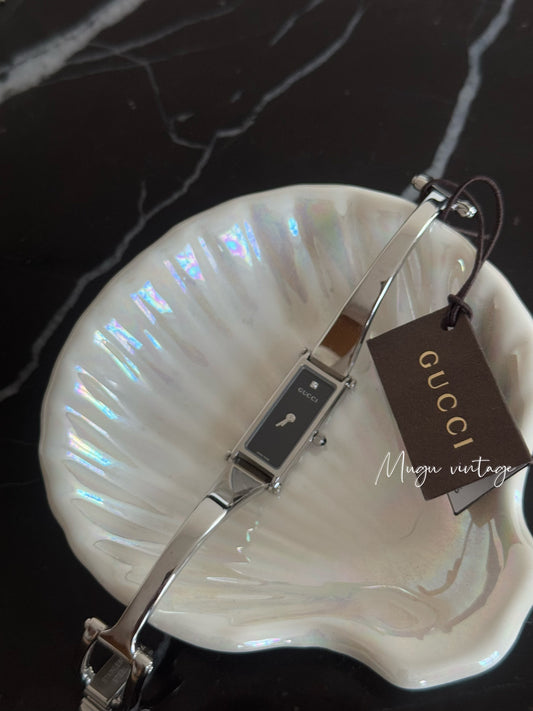 Gucci black x silver watch with diamond