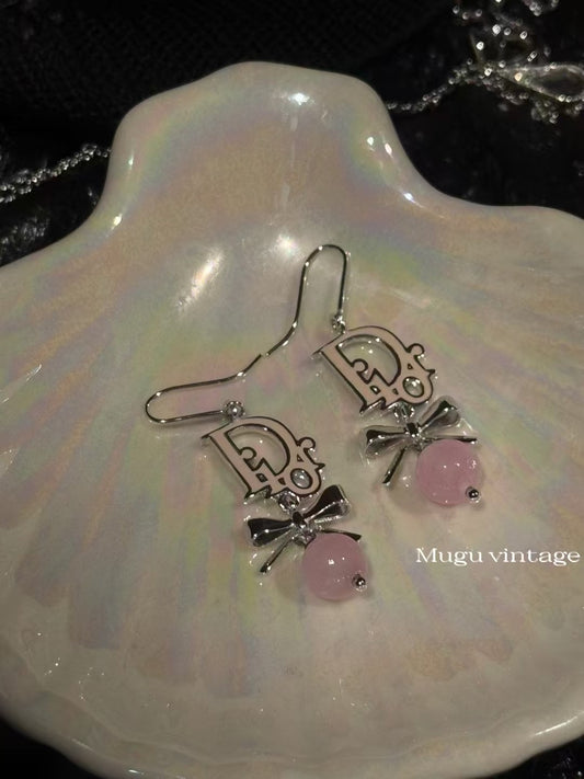 Christian Dior pink bow earring