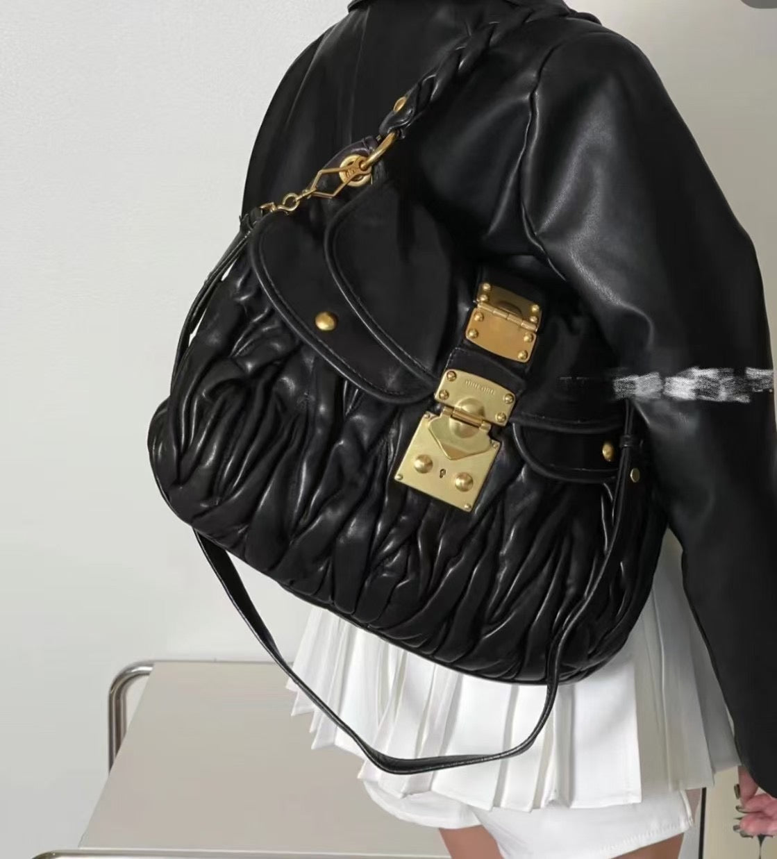 Miu Miu black gold crossbody