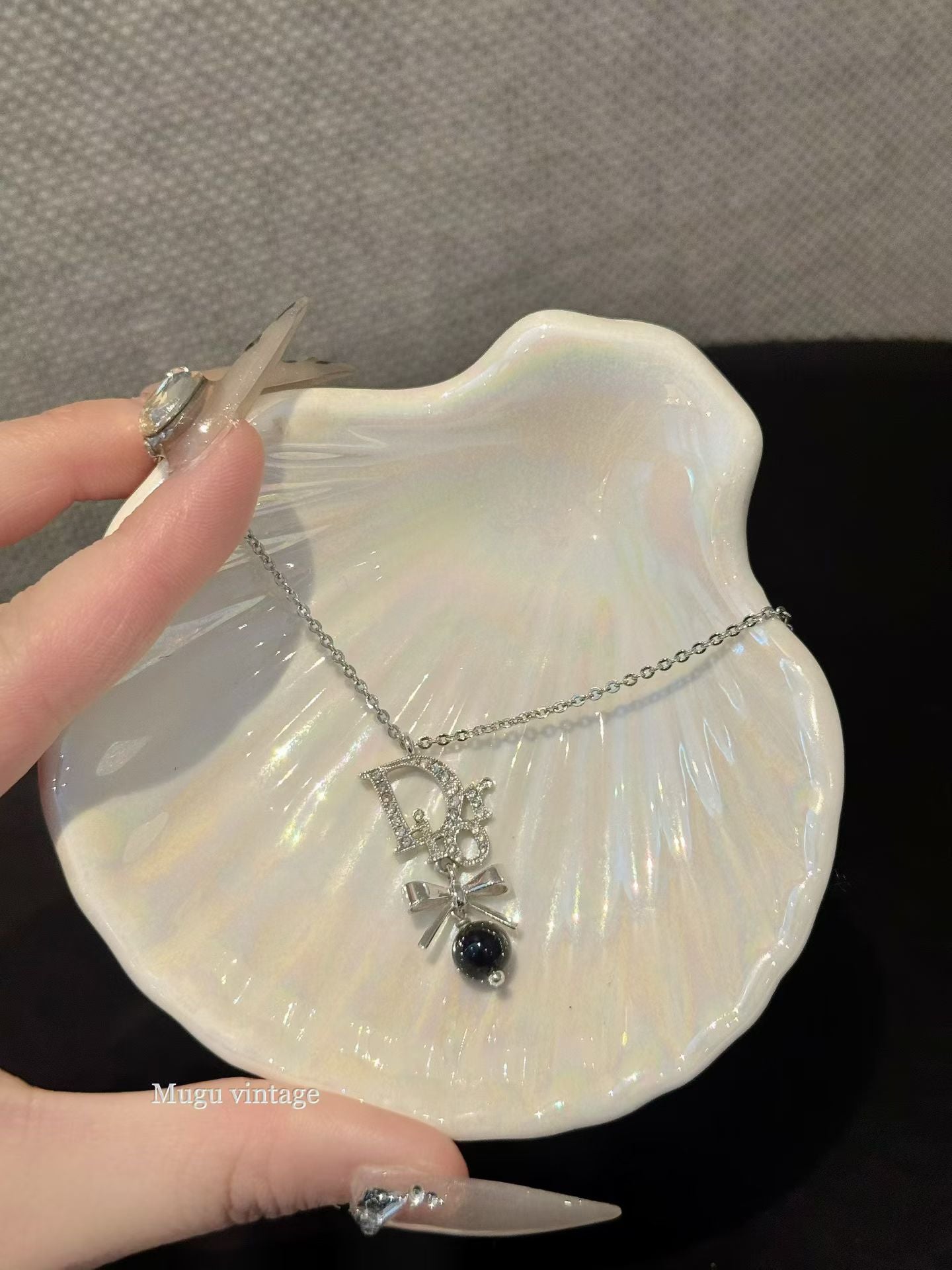 Christian Dior black pearl bow necklace