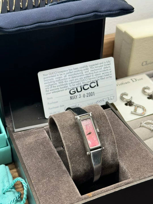 Gucci pink shell quartz watch