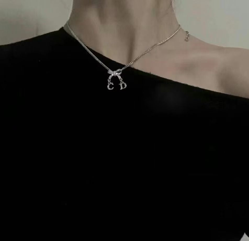 Dior snow bunny bow necklace