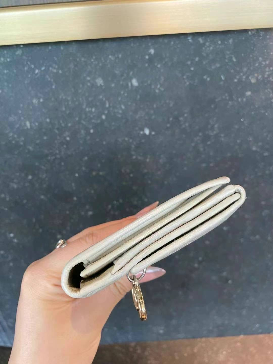 Gucci Guccisimi wallet in white / gold