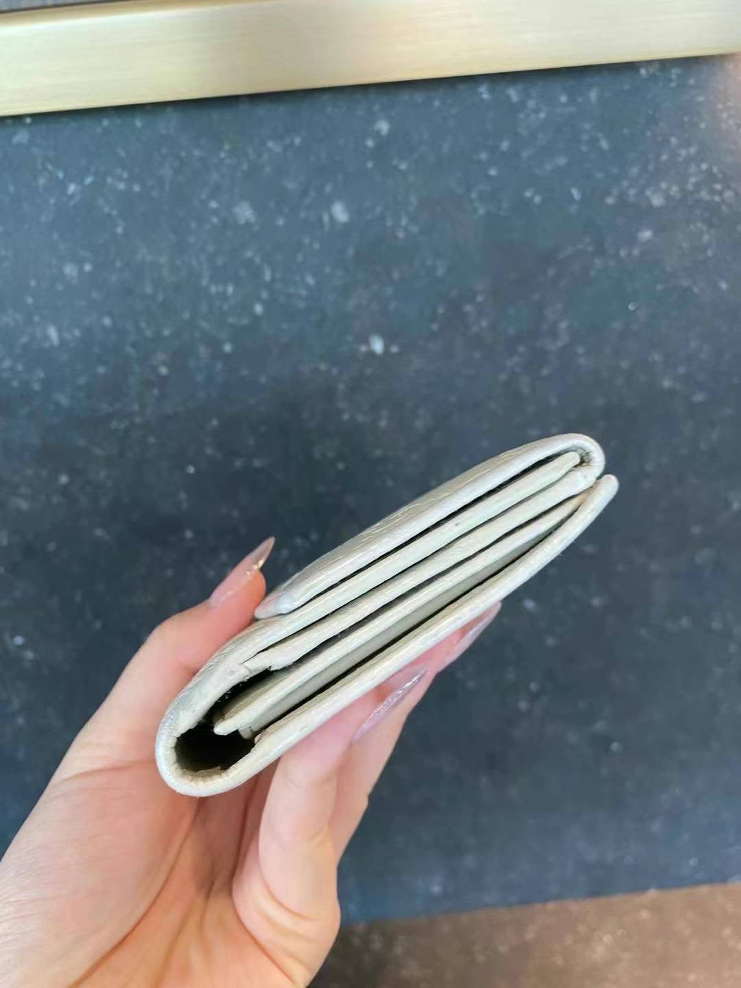 Gucci Guccisimi wallet in white / gold