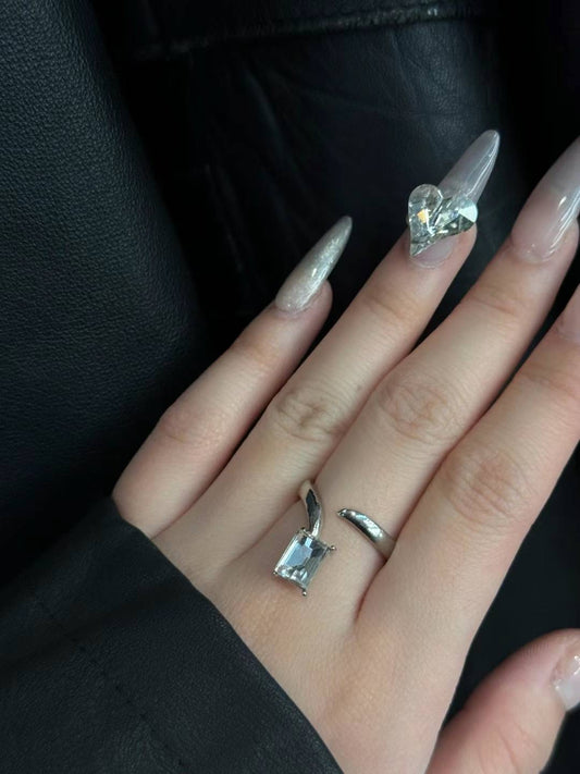 Silver swirl rhinestone ring