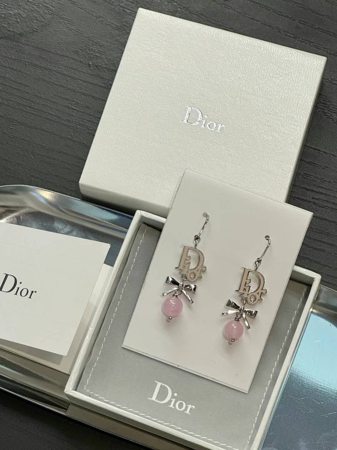 Christian Dior pink bow earring