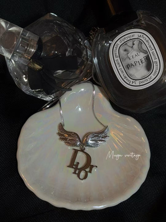 Dior 2004 angel feather