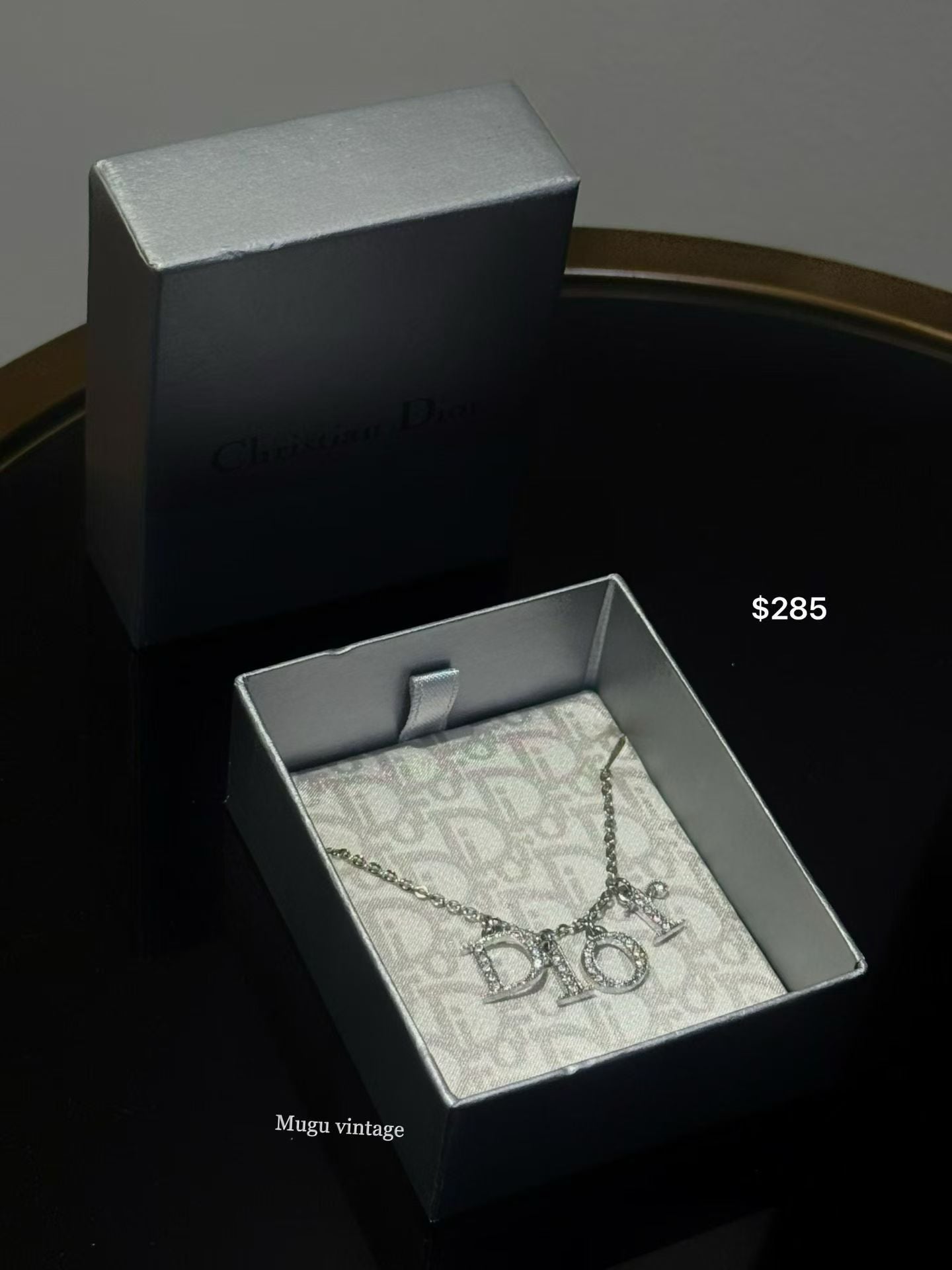 Christian Dior silver rhinestone letter necklace