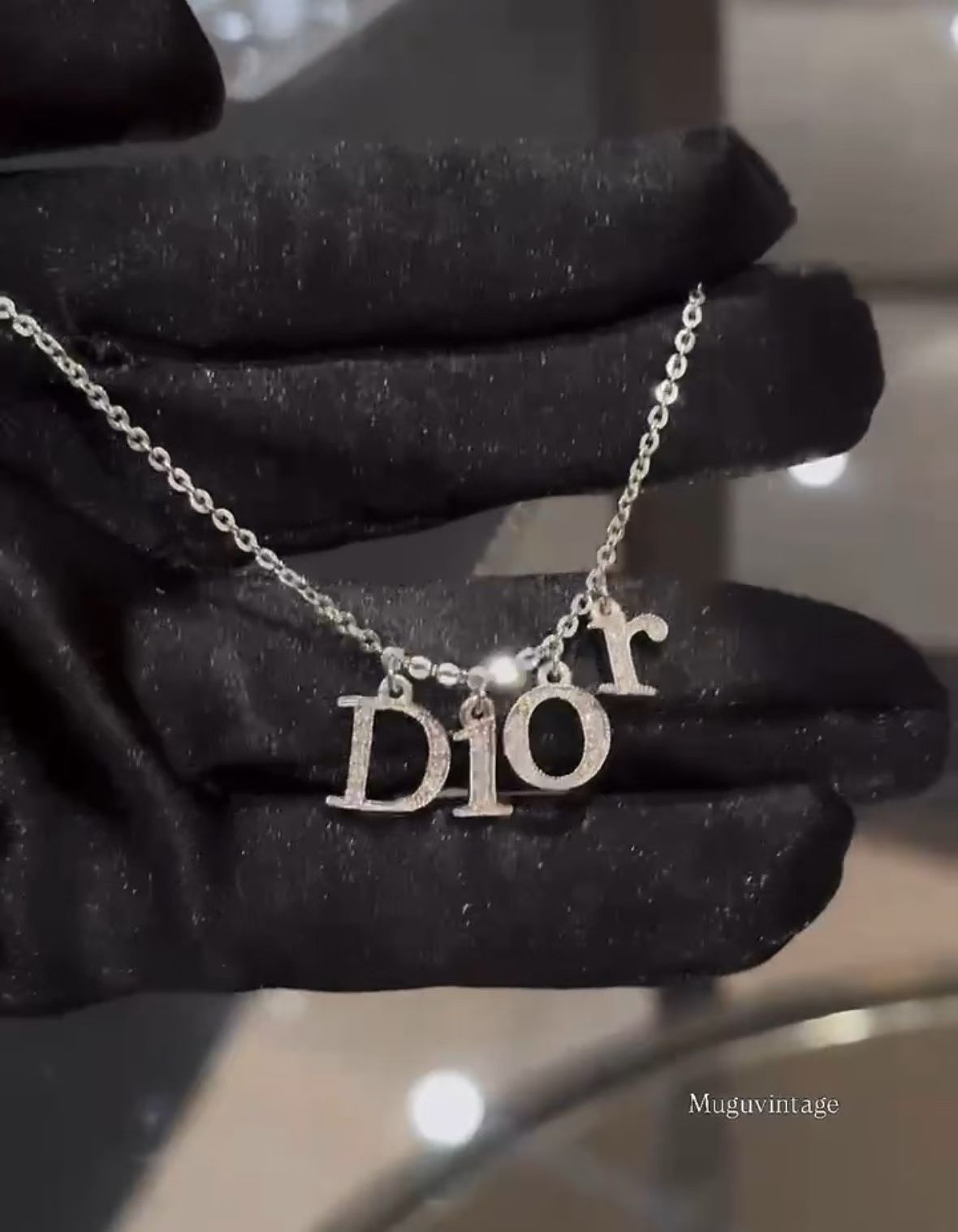 Christian Dior silver rhinestone letter necklace