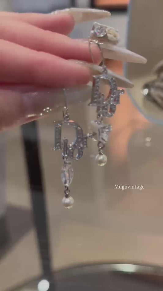 Dior butterfly pearl dream earring